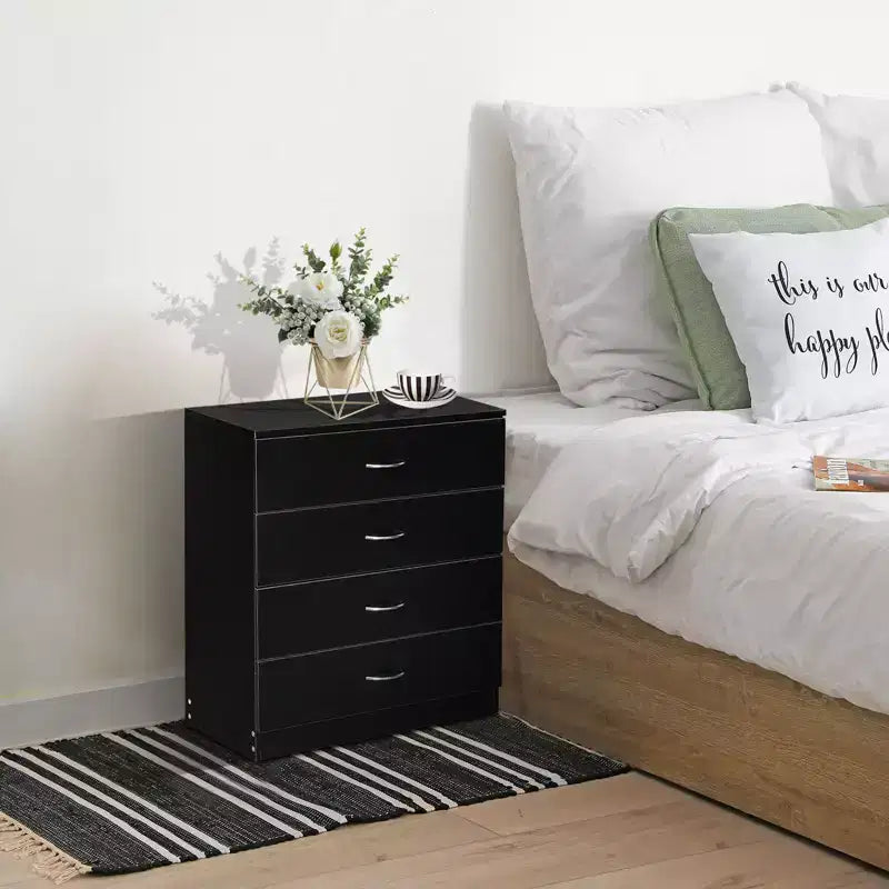 Commode à 4 tiroirs en panneaux de particules noirs de 66 cm de large