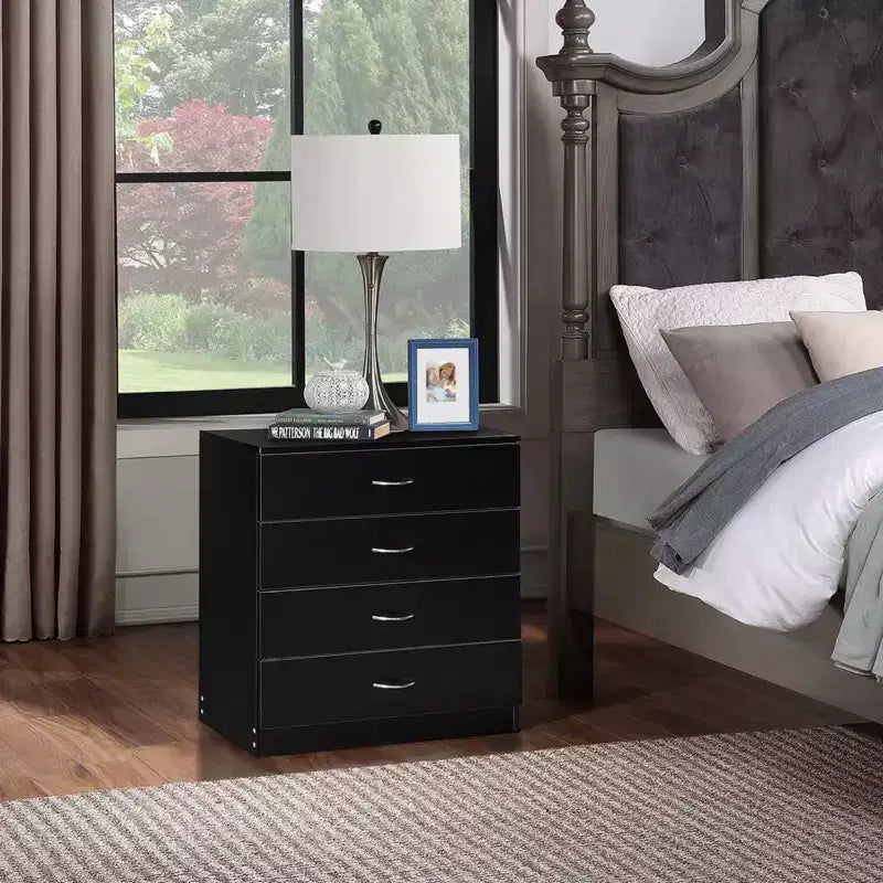 Commode à 4 tiroirs en panneaux de particules noirs de 66 cm de large