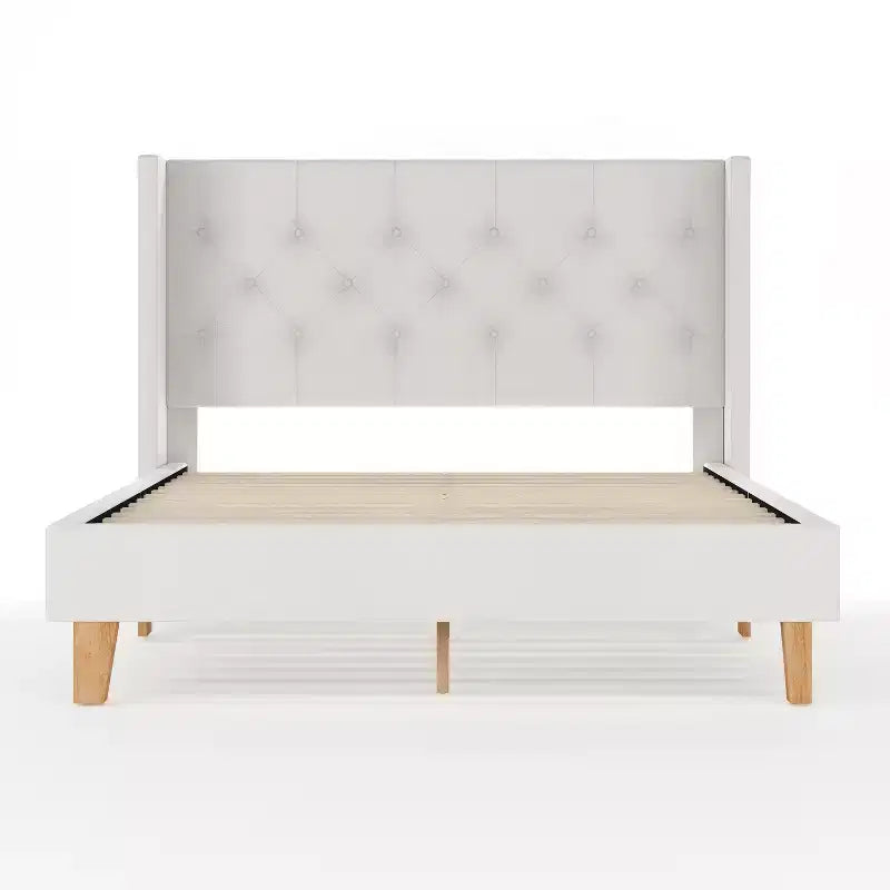 Lit plateforme rembourré avec tête de lit capitonnée à oreilles et longerons latéraux matelassés