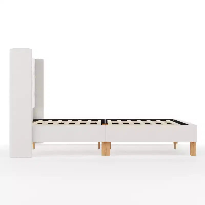 Lit plateforme rembourré avec tête de lit capitonnée à oreilles et longerons latéraux matelassés