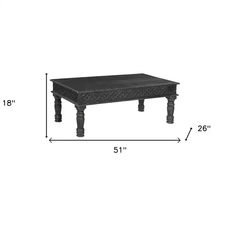 Table basse noire en bois massif vieilli